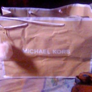 Never used Michael Kors purs with Michael Kors gif